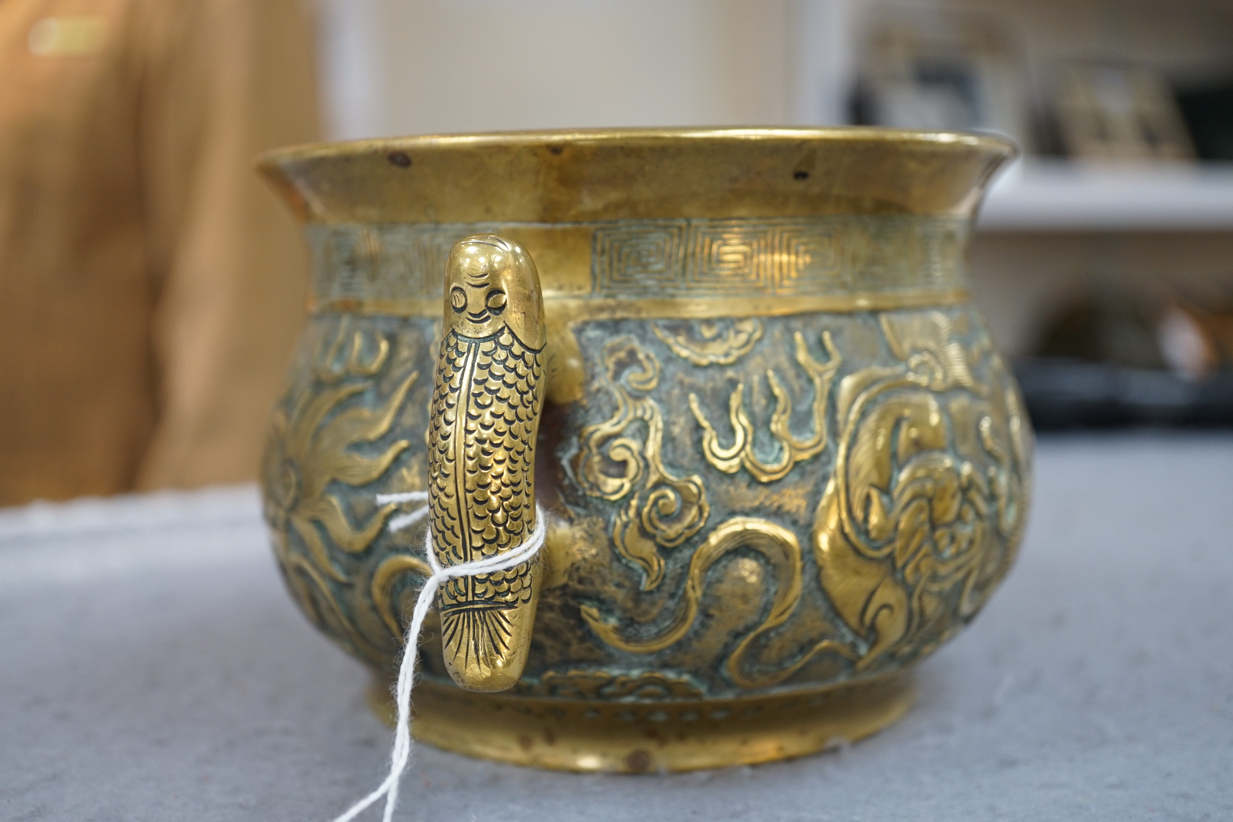 A Chinese polished bronze ‘Buddhist lion’ censer, gui, 19th century, 19.5cm wide, rim diameter 14cm